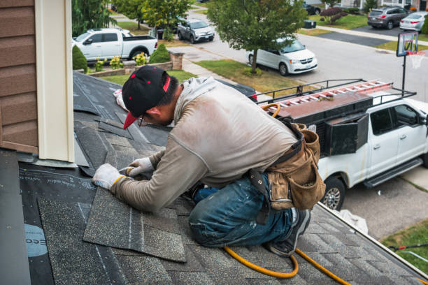 Professional Roofing technician working in Brentwood, CA
